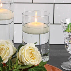 Eastland Cylinder Floating Candle Holder 3.25"x6" Set Of 12 -Candle Decorations c1c79762 504f 4e8f 9d0c 2757dec5b189 dc33f9f3 dbec 4198 89ec 0401dd826d70